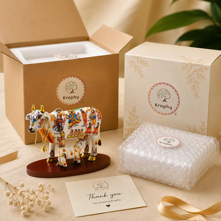 Kraphy Kamdhenu Cow & Calf Statue with Om Design | Resin Figurine – 6 Inch size guide