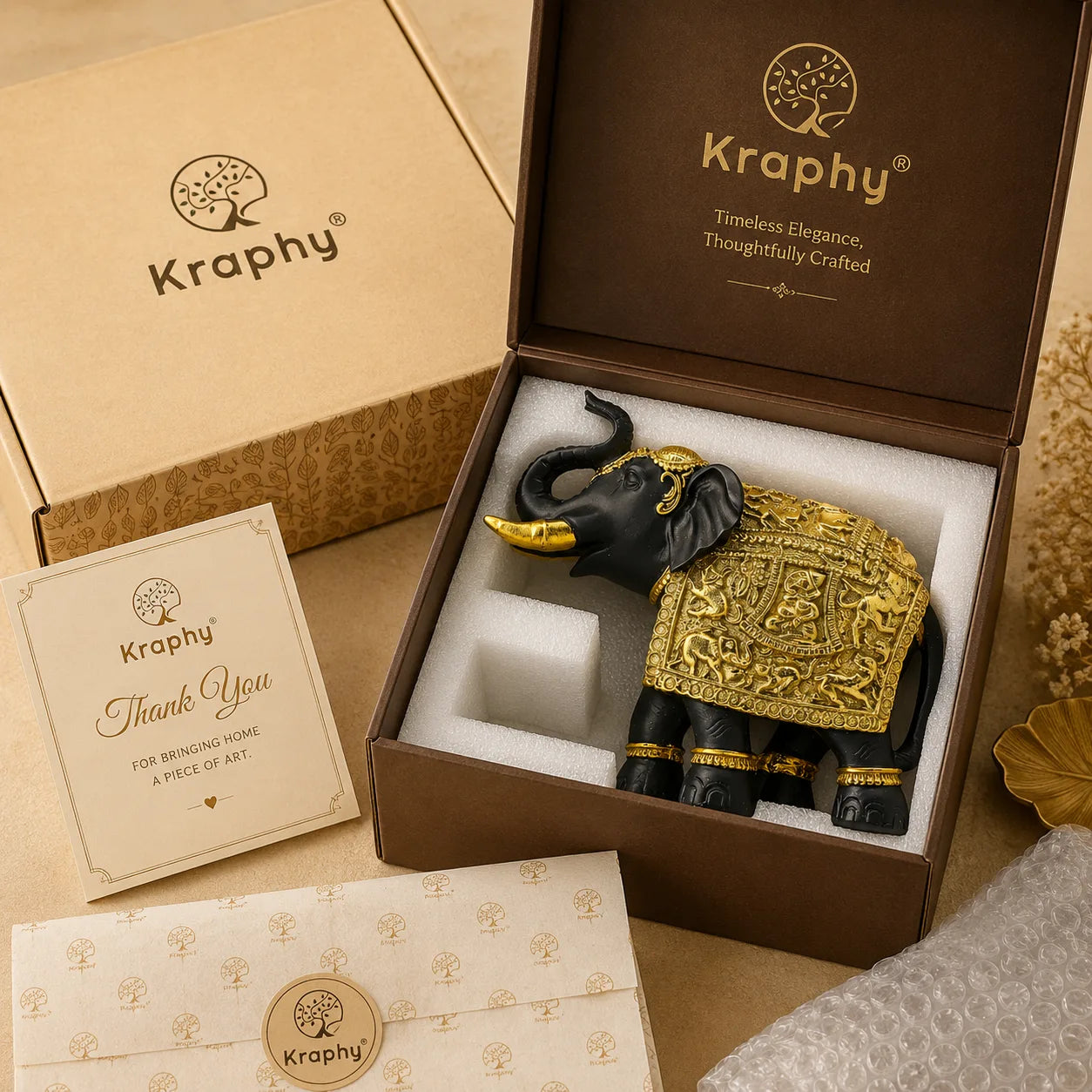 Kraphy Black & Gold Elephant Showpiece with Raised Trunk | Resin Figurine – 9 Inch