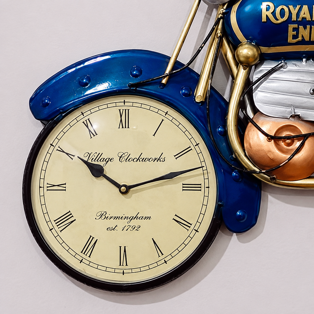 Close-up of the cream Roman numeral clock face with black hands beneath the blue motorcycle's front fender.